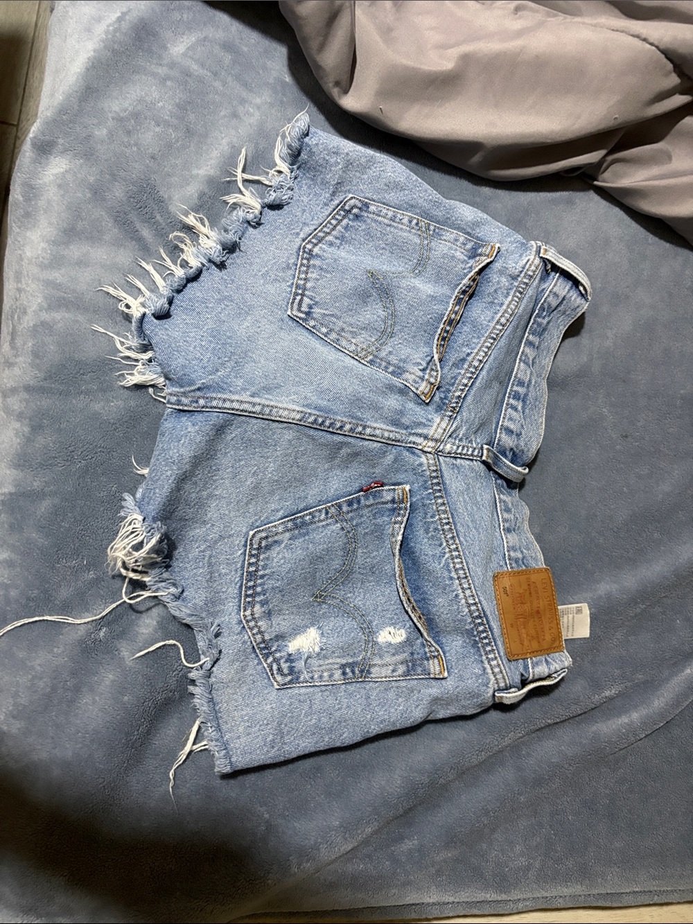 Levi's Light Wash Distressed Denim Cutoff Shorts